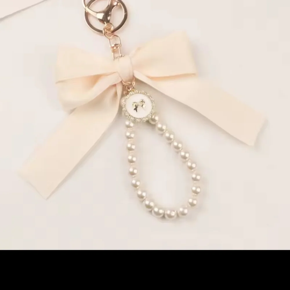 Elegant White Bow Phone Case with Pearl Chain